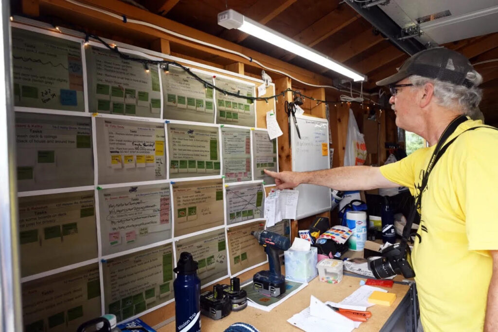Stuart Wells, coordinator for Mission Trip Birdsboro, looks over assignment locations at St. Mark's Lutheran Church in Birdsboro on Thursday, July 16, 2026. (BILL UHRICH/READING EAGLE)
