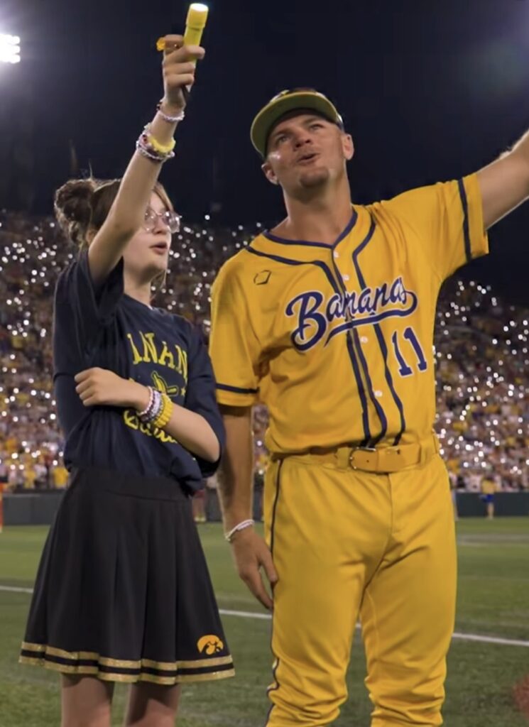 Savannah Bananas and fans performed the Hawkeye Wave recently for patients watching  from a nearby children's hospital.